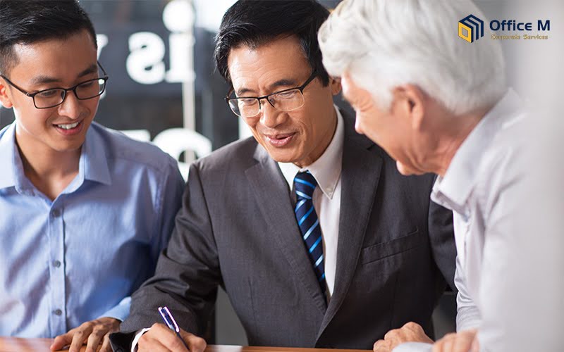 Business people discussing a nominee director service agreement.