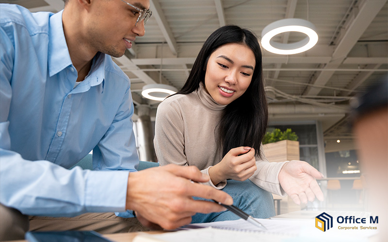 Foreign entrepreneurs discussing Singapore company registration.